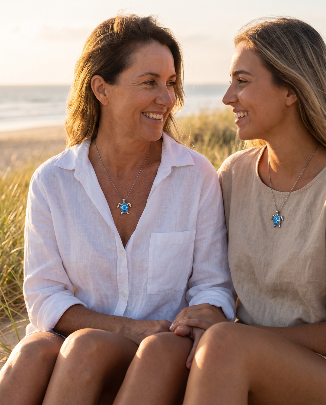 Mother and daughter wearing matching Sea Turtle necklaces
