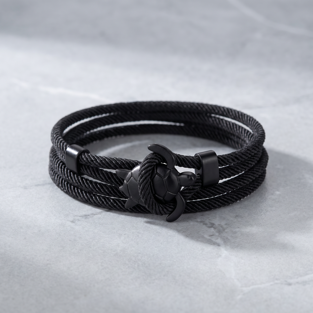 The Leather Back Bracelet: black multi-wrap cord with turtle clasp